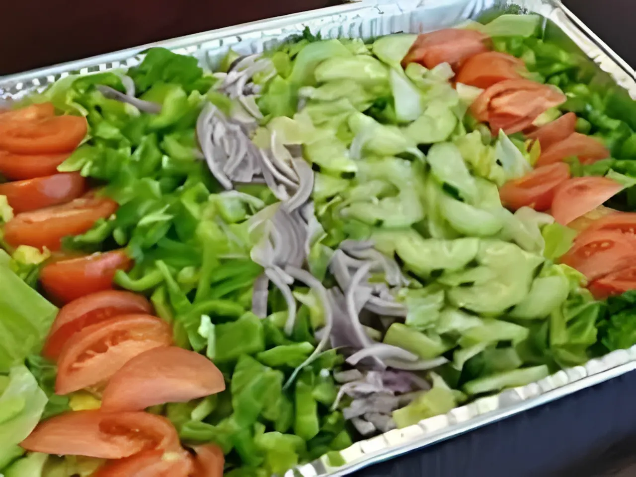 Colorful salad with tomatoes, peppers, cucumbers.