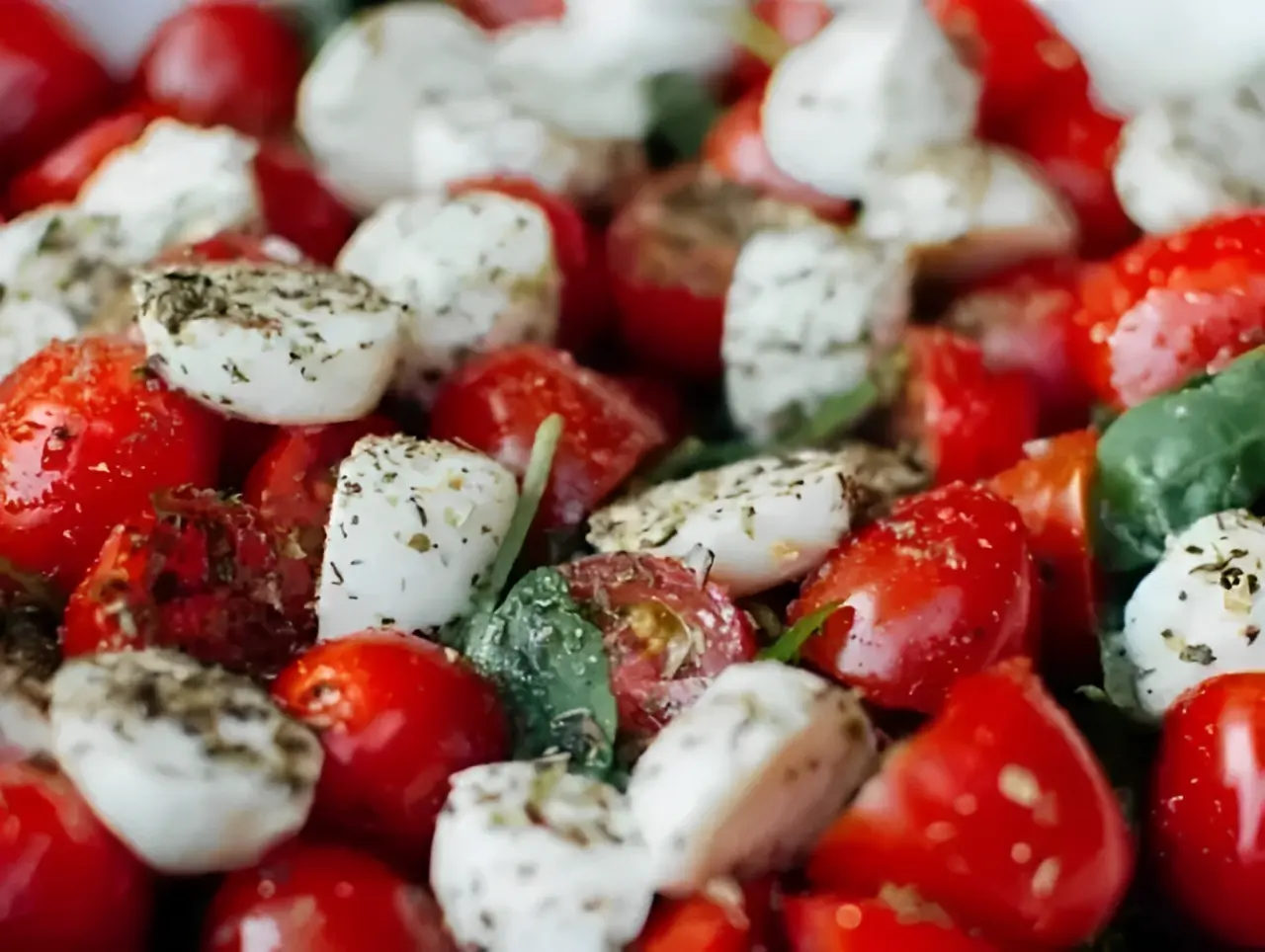 Caprese salad with tomatoes, mozzarella, and basil.